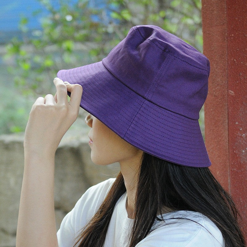 Solara Wide Brim Bucket Hat